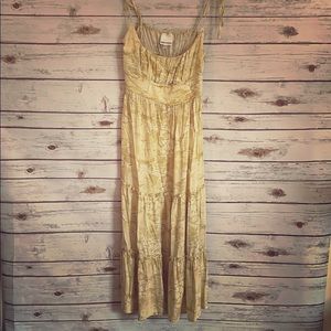 Light mustard and white color midi dress.